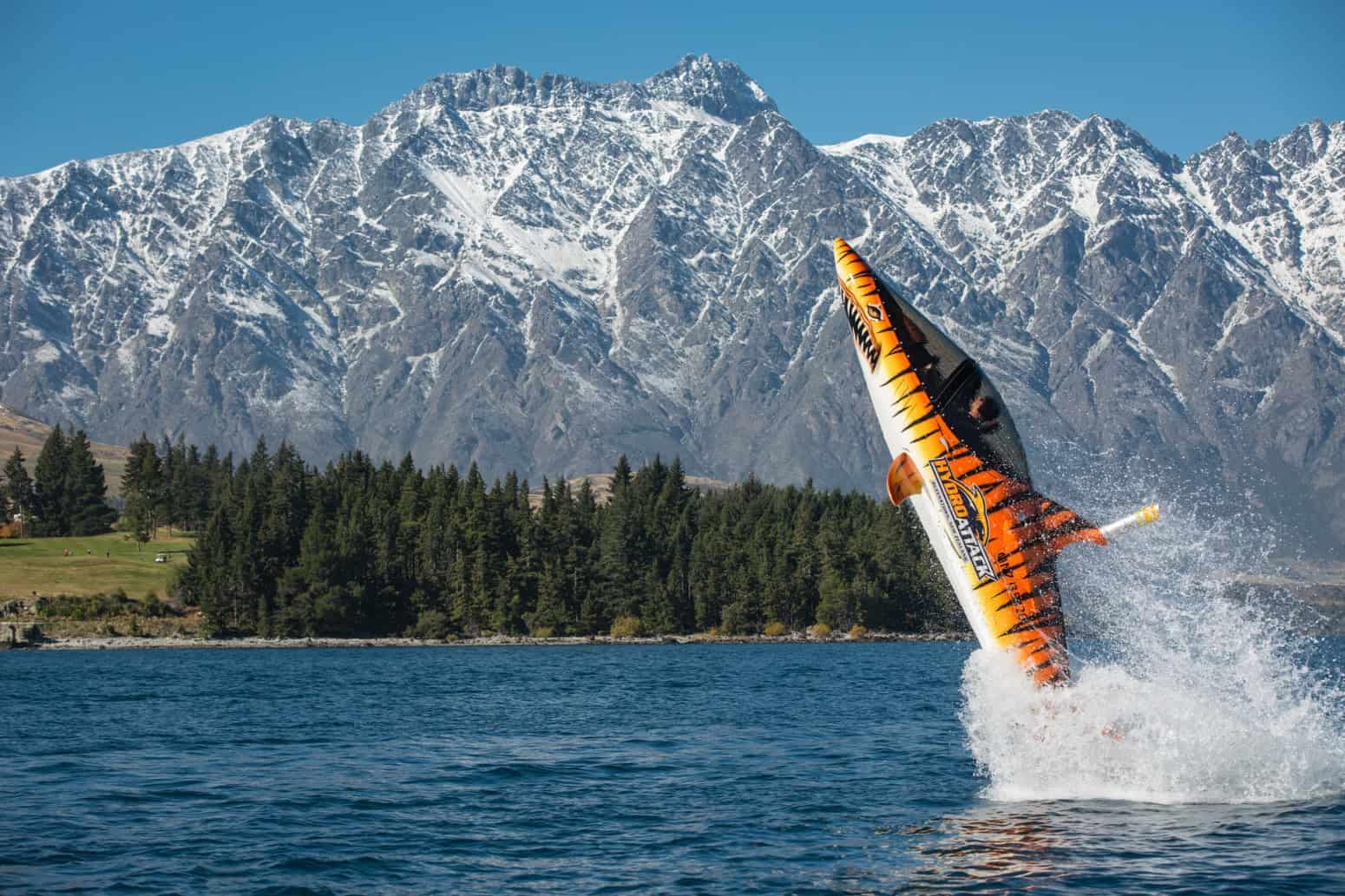 hydro-attack-queenstown-submersible-shark-ride-feature-1 | Must Do New Zealand | Must Do New Zealand Hydro Attack Queenstown semi-submersible shark on Lake Wakatipu jumping out of water