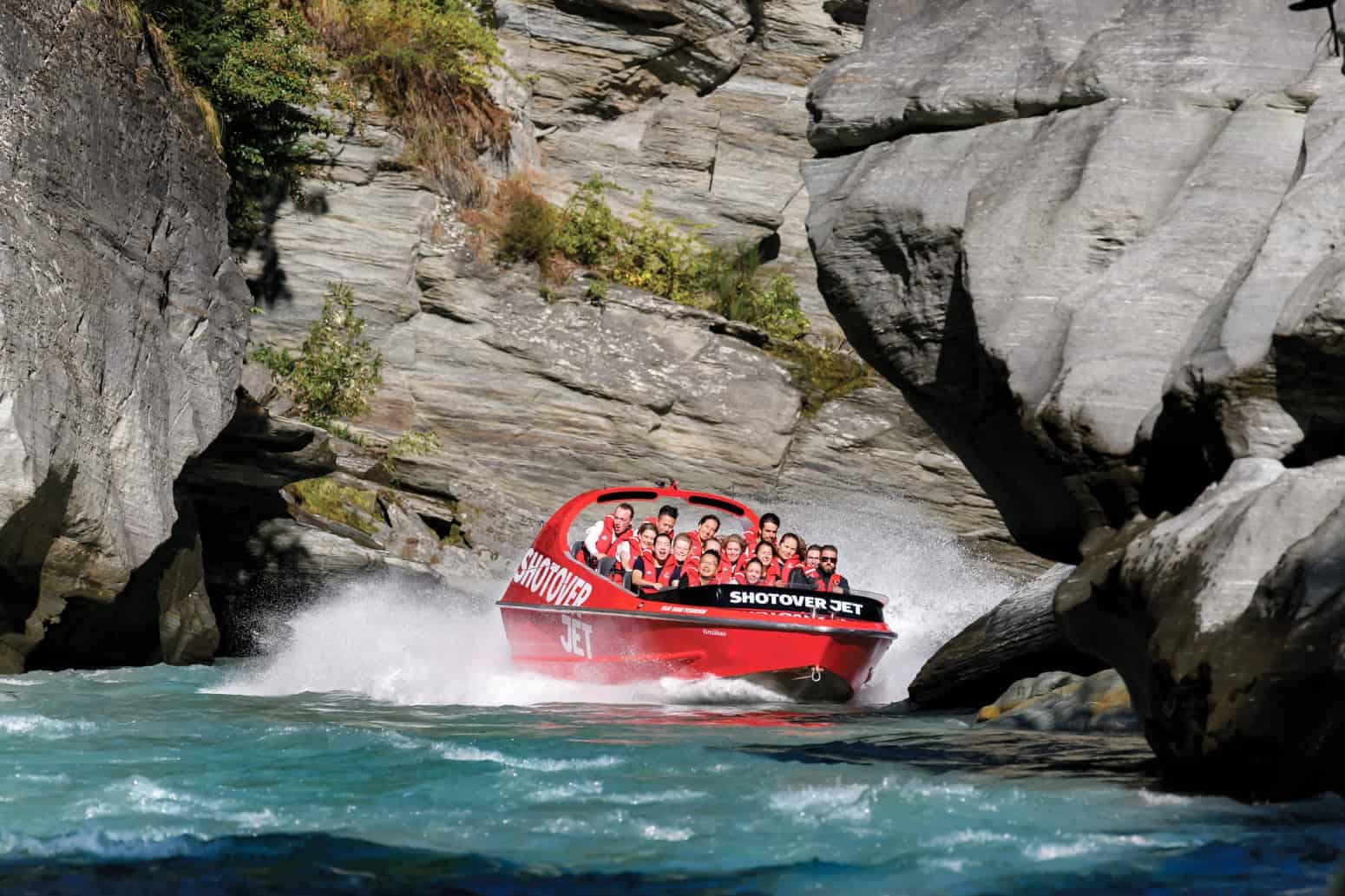 jet-boating-queenstown-shotover-jet-feature-1 | Must Do New Zealand | Must Do New Zealand Shot over jet speeding in the shot over river canyon